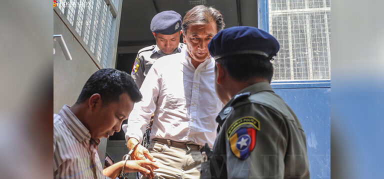 John Fredric Todoroki (center) arrives for a court hearing in May 2019. / Zaw Zaw / The Irrawaddy