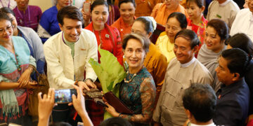 Party lawmakers and members welcome Daw Aung San Suu Kyi to a celebration of her 74th birthday Wednesday in Naypyitaw. / Myanmar State Counselor’s Office / Facebook