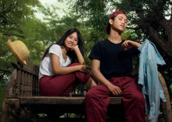 A boy and girl wear unisex cotton pants by Cotton Bagan. / Supplied