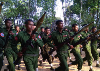 Arakan Army fighters hold rocket-propelled grenades in a photo posted to the group's Facebook page in May.