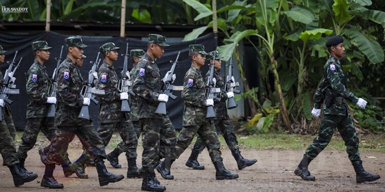 Soldiers from the Karen National Liberation Army’s Brigade No. 5 march in Karen State’s Papun District in August 2018. / Aung Kyaw Htet / The Irrawaddy