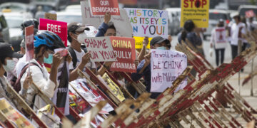 Anti-coup protesters call on Beijing to refuse to help Myanmar’s military regime at a rally in front of the Chinese Embassy in Yangon on Feb.15. / The Irrawaddy