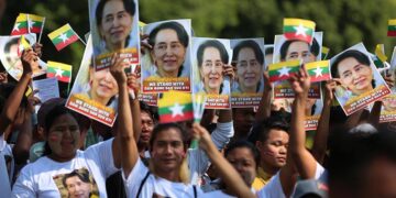 Tens of thousands of people gather in downtown Yangon on Tuesday to show support for State Counselor Daw Aung San Suu Kyi, who is in the Netherlands to defend Myanmar against a charge of genocide at the International Court of Justice. / Myo Min Soe / The Irrawaddy