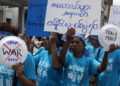 Women take part in the International Day of Peace march in Yangon in 2012. / The Irrawaddy
