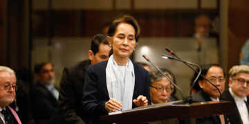 Myanmar State Counselor Daw Aung San Suu Kyi takes the podium at the ICJ on Dec 11. / State Counselor’s Office