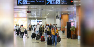Foreign travelers arrive at Yangon International Airport on Jan. 31, 2020. / Myo Min Soe / The Irrawaddy