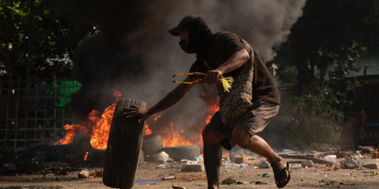 An anti-regime protester in Yangon. / The Irrawaddy