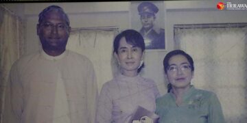 U Ko Ni, left, with Daw Aung San Suu Kyi and his wife in an undated photo taken at the lawyer’s office in Yangon. / Myo Min Soe / The Irrawaddy