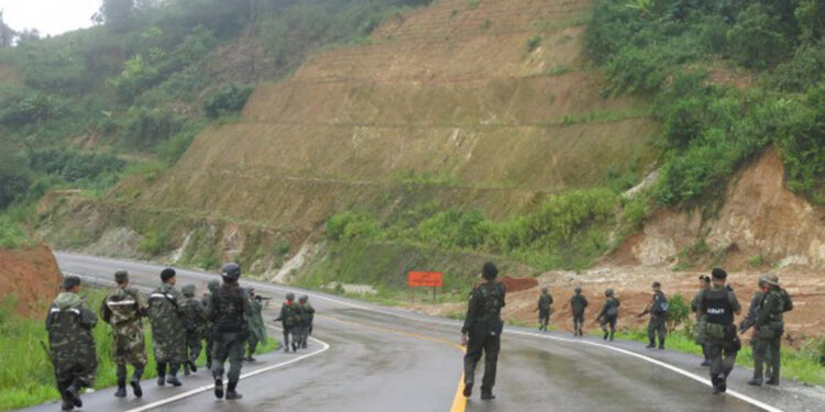Border Guard Force groups monitor a section of the Asian Highway in July 2015. / Kyaw Kha / The Irrawaddy