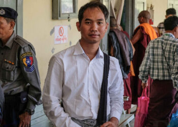 Swe Win, an editor at Myanmar Now, appears at court in Mandalay today. / Zaw Zaw / The Irrawaddy