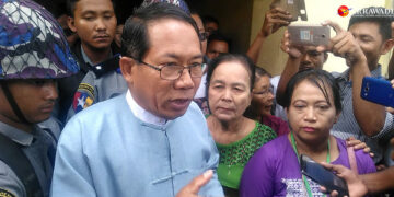 Dr. Aye Maung talks to the media during a court appearance in Sittwe in October 2018. / Min Aung Khine / The Irrawaddy