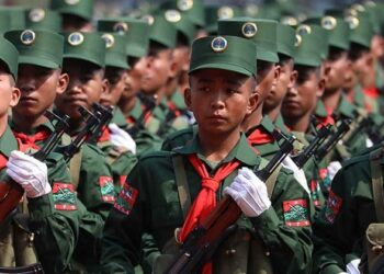 United Wa State Army soldiers mark the 30th anniversary of the army’s founding in Panghsang in 2019. / The Irrawaddy