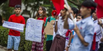 Students stage a protest against the cutting down of trees on the Yangon University campus on Monday. / Htet Wai / The Irrawaddy