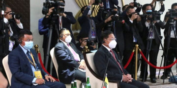Myanmar coup leader Snr-Gen Min Aung Hlaing (right) and junta-appointed foreign minister Wunna Maung Lwin (center) attend the ASEAN summit in Jakarta, Indonesia on April 24. / Senior General Min Aung Hlaing