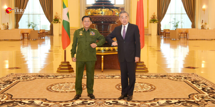 Myanmar military chief Snr-Gen Min Aung Hlaing (left) and Chinese Foreign Minister Wang Yi in Naypyitaw in January 2021, one month before the coup.