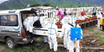 A funeral for people who died from COVID-19 at a cemetery in Kalaymyo, Sagaing Region in June.