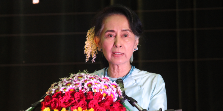 Currently detained State Counselor Daw Aung San Suu Kyi addresses a meeting at the National Reconciliation and Peace Centre, which she chaired, in January 2017. / The Irrawaddy