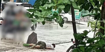The corpse of a ward administrator shot dead in Hlaing Tharyar Township, Yangon in June.