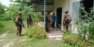 Myanmar junta troops are seen at a home in Lay Kay Kaw during the raid on Dec. 14. / Saw Tar Tu