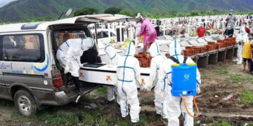 A charity organizing funerals for COVID-19 patients at a cemetery in Kale, Sagaing Region. / CJ