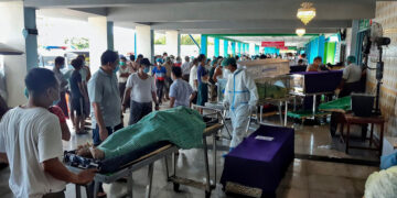 Bodies are lined up for cremation at Yeway Cemetery on July 12. / Supplied