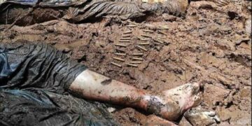 The grave of the slain men.