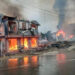 Houses burn after junta forces opened fire on a residential area using heavy weapons and explosives in Thantlang, Chin State on Saturday. / CJ