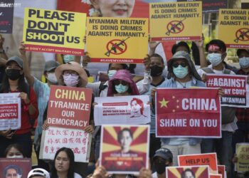 Anti-regime protesters in front of the Chinese Embassy in Yangon in February. / The Irrawaddy
