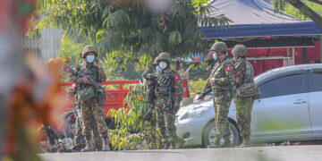 Soldiers from Light Infantry Division 33 deployed on the streets of Mandalay during anti-regime protests in February. / The Irrawaddy