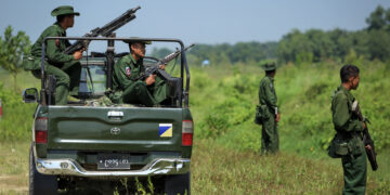 A heavily-armed Myanmar army patrol in Maungdaw Township, Rakhine State near the border with Bangladesh on October 16, 2016.