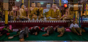 Villagers in Kyaukme Township take refuge at a Buddhist monastery after fleeing their homes following fighting between government troops and the Restoration Council of Shan State in 2020. / The Irrawaddy