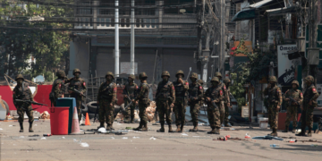 Regime troops are deployed to crack down on protesters in Yangon in early March. / The Irrawaddy