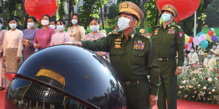 Coup leader Snr-Gen Min Aung Hlaing opens the MoeKaung Treasure Maternal and Child Hospital in Yangon on Sunday. / Global New Light of Myanmar