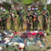 Soldiers from the TNLA and MNDAA pose with weapons seized from the Myanmar military in Kutkai Township on Wednesday. / Kokang123 / VK