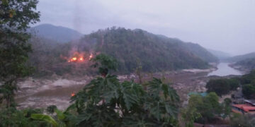 A Myanmar military base at Thaw Le Hta, on the banks of the Salween River, seen burning on the morning of April 27 after being attacked by KNLA troops. / Kawthoolei Today / Facebook