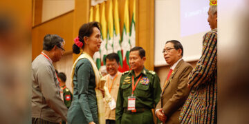 Myanmar State Counselor Daw Aung San Suu Kyi (second left) is seen with leaders of the Myanmar military and ethnic armed organizations at the 8th Joint Implementation Coordination Meeting between the government and 10 EAOs in Naypyitaw on Jan. 8, 2020. / Myanmar State Counselor’s Office