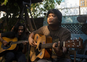 The Peacists perform their latest tracks at a gig to preview their new album, ‘Kyal Kabar Kha Yee Sin’, at the Madnest clothing store in Yangon. / Aung Kyaw Htet