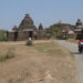 Local people pass by Htukkan Thein temple on March 17, a day before the Myanmar Army opened fire in downtown Mrauk-U.   / Moe Myint / The Irrawaddy