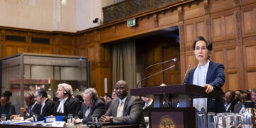 Myanmar State Counselor Daw Aung San Suu Kyi addresses the judges at the International Court of Justice in The Hague on Dec. 11, the second day of hearings in a case filed by The Gambia against Myanmar alleging genocide against Rohingya Muslims in Rakhine State. / ICJ