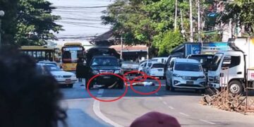 Security forces in a car ram protesters in Kyimyindaing Township on Dec. 5.