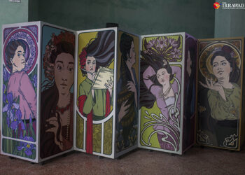 Burmese artist Thee Oo Thazin’s ‘Myanmar Women in Art Nouveau’ on display at Building Bridges Yangon. / Htet Wai / The Irrawaddy
