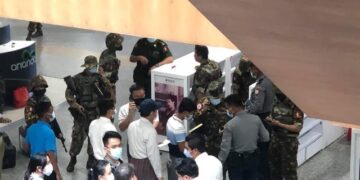 The military regime's forces arrive at the Myanmar Plaza shopping mall in Yangon's Bahan Township after an explosion  on Wednesday afternoon.