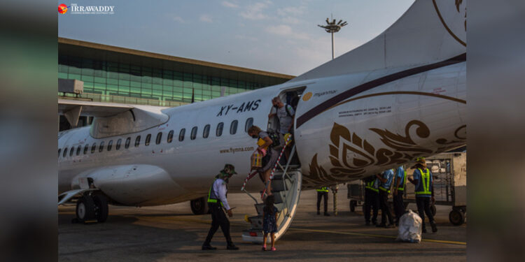 A domestic flight in Yangon in March. / Htet Wai