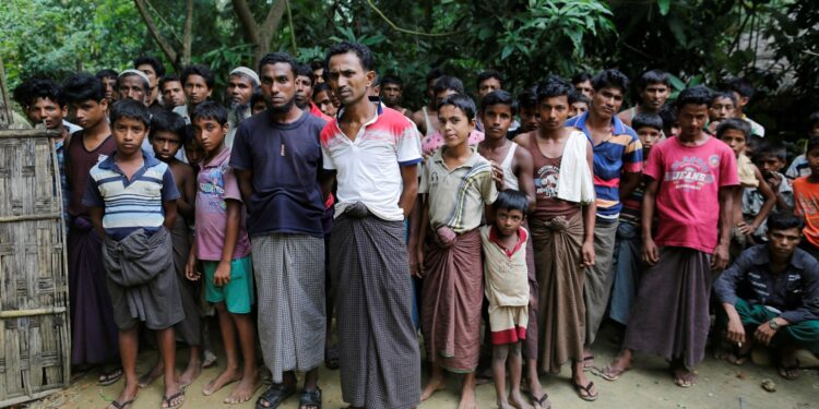 Rohingya Muslim men stand at U Shey Kya village outside Maungdaw in Arakan State. (Photo: ) / Soe Zeya Tun / Reuters