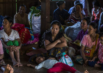 Villagers fleeing their homes due to intensified fighting take shelter at a monastery in Kyaukme Township. / Htet Wai / The Irrawaddy