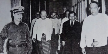 Burma Socialist Programme Party Chairman U Ne Win (second from left) and U Khin Nyunt (left) see off U San Yu (second from right) as he leaves on a goodwill trip to Korea at the Yangon International Airport.