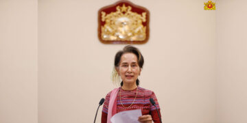 Daw Aung San Suu Kyi briefs the public on the ICJ hearings on state TV on Wednesday. / State Counselor’s Office