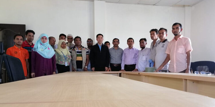 Chinese Ambassador to Bangladesh Zhang Zuo, center, meets with Rohingya rights campaigners at a refugee camp in Ukhia, Cox’s Bazar district, Bangladesh on Tuesday.  / Supplied by Rohingya rights campaigners 