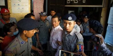 John Fredric Todoroki (center) during a court hearing in May 2019. / Zaw Zaw / The Irrawaddy