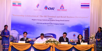 Leaders of KBZ and PTT sign agreements at a ceremony held on Sunday. / Photo Supplied.